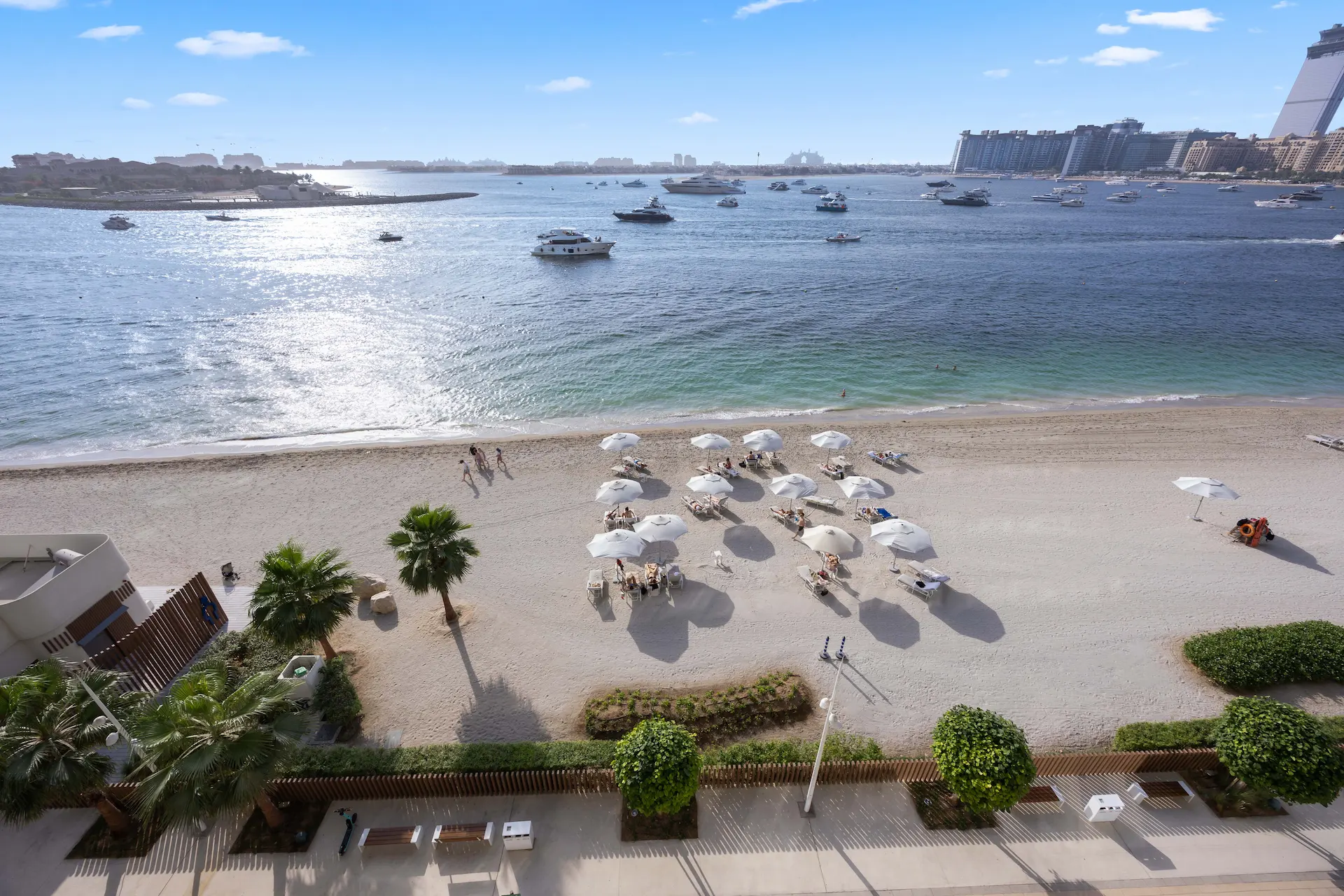 Luxury beachfront apartment view at Emaar Beachfront Dubai with Arabian Gulf sunset