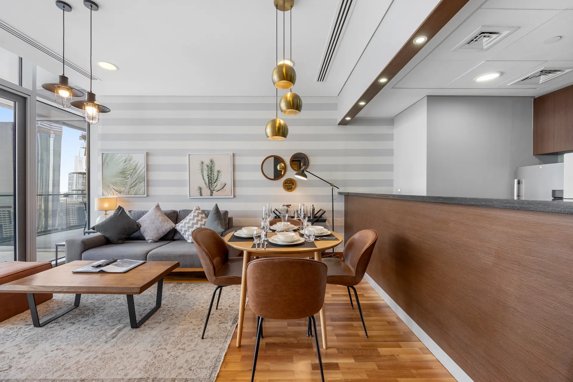 Dining table in open plan living area at Burj Daman DIFC Dubai