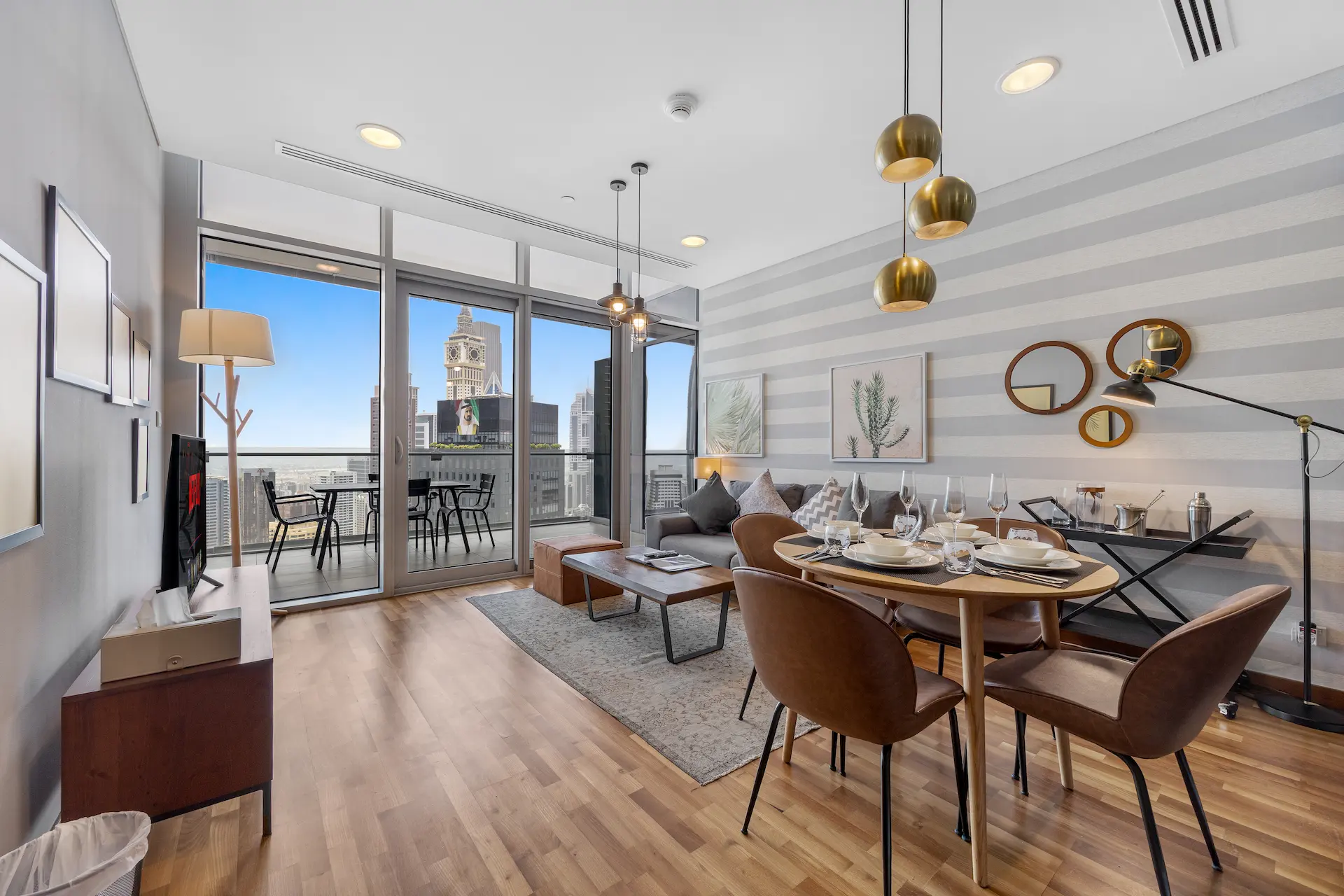 Living and dining area with DIFC views at Burj Daman DIFC Dubai