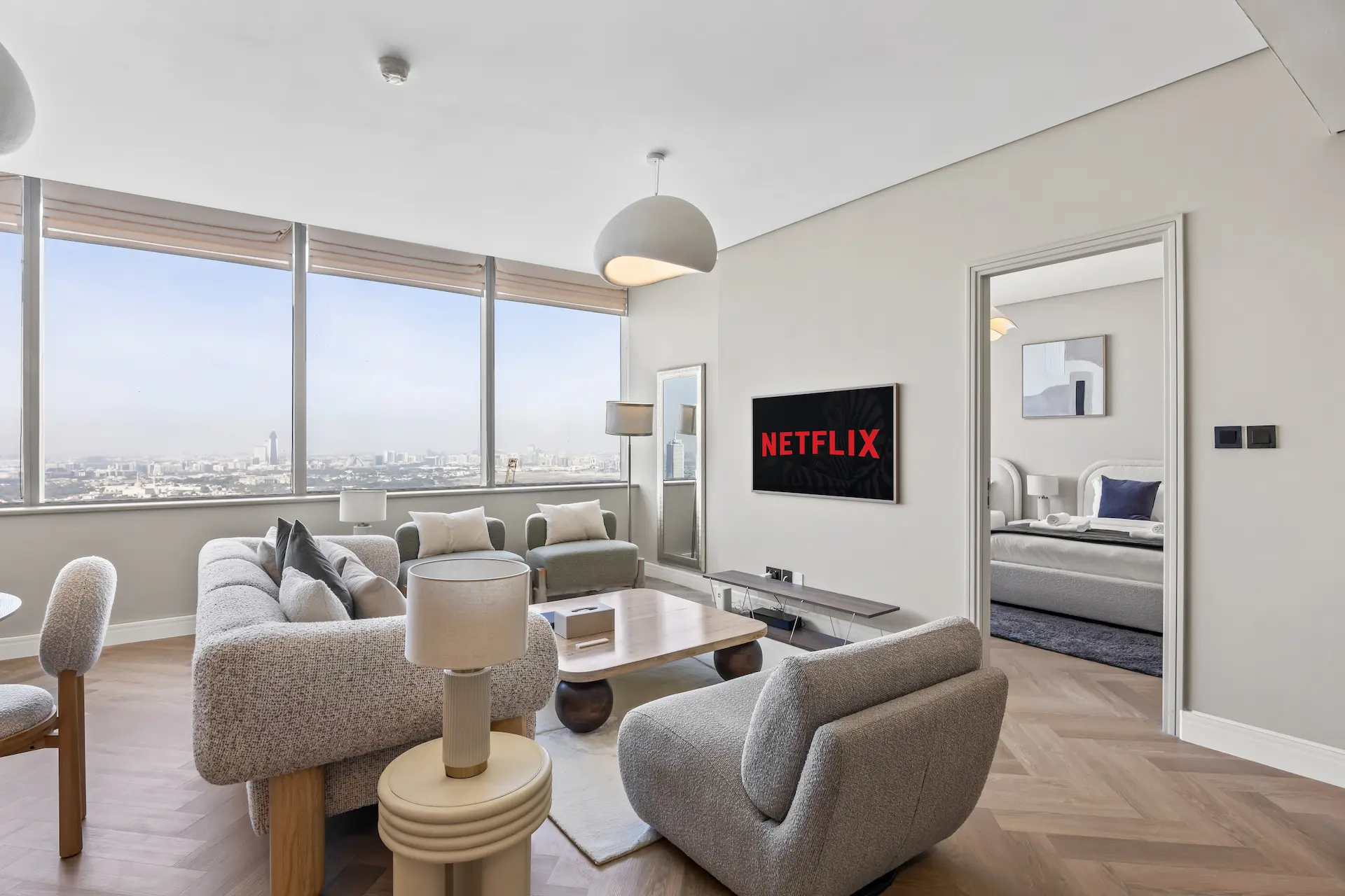 Modern lounge with designer furniture and Netflix smart TV at Sky Gardens DIFC Dubai