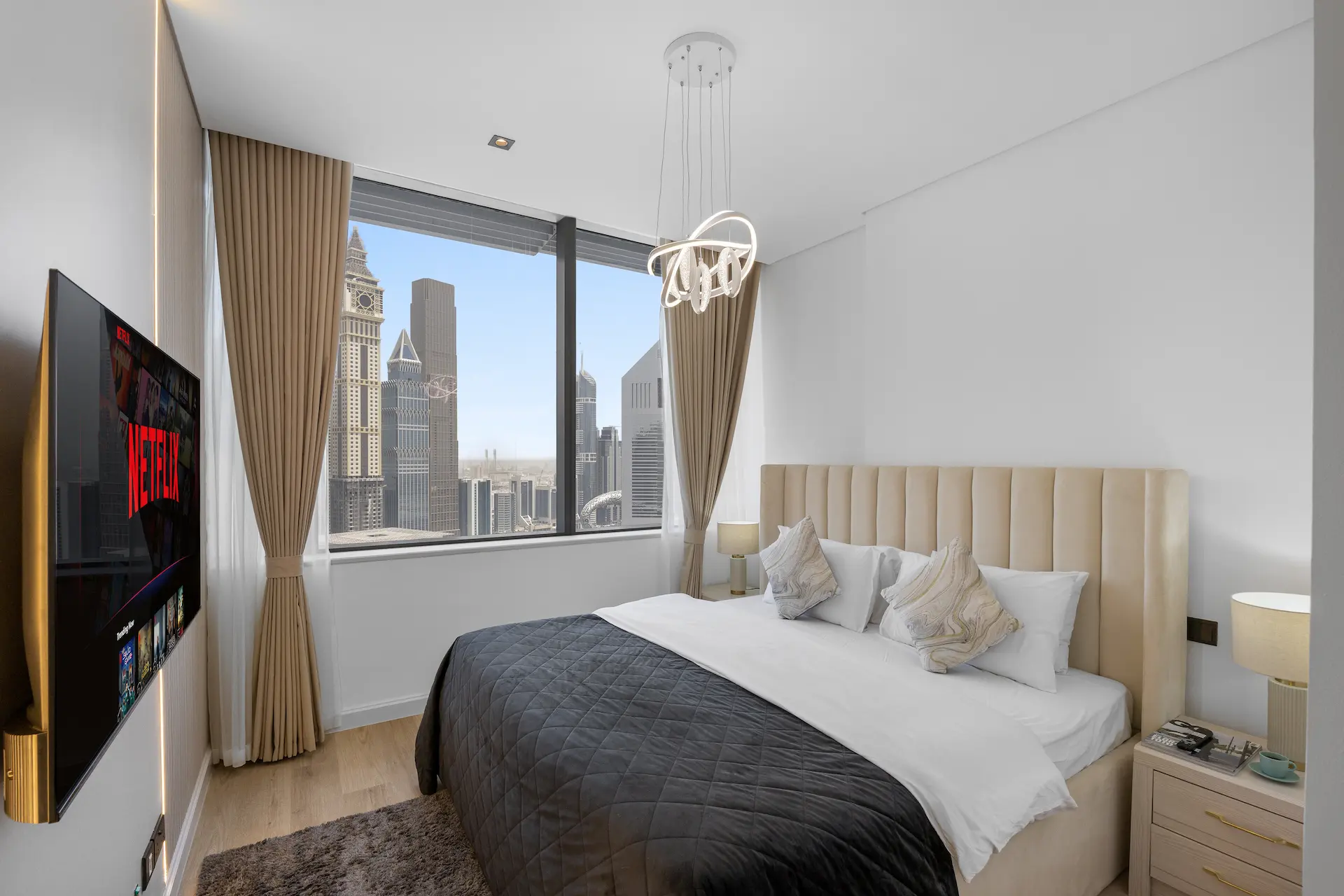 King bedroom with DIFC skyline and Netflix smart TV at Sky Gardens Business Class apartment Dubai